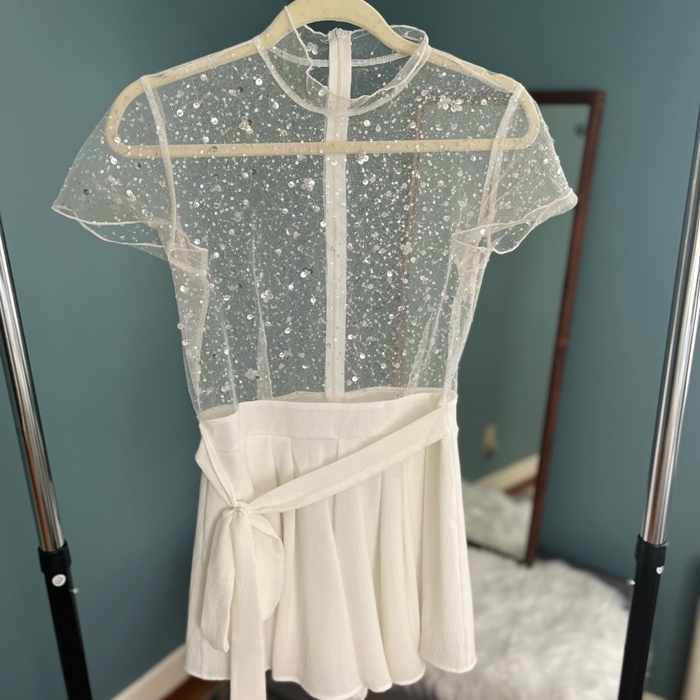Lucy in the sky romper. Worn once